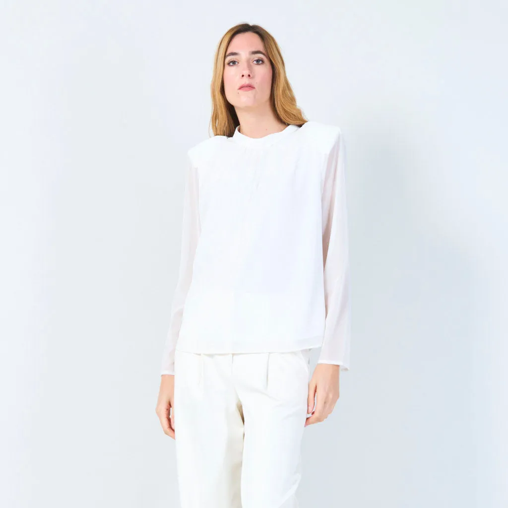 High-neck blouse with subtle textured detail wholesale